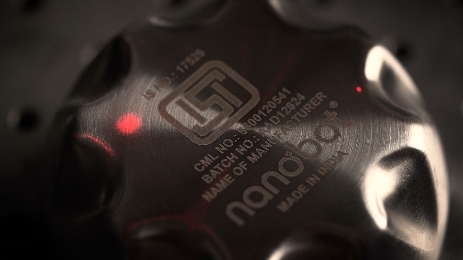 A laser-marked Made in India bottle base